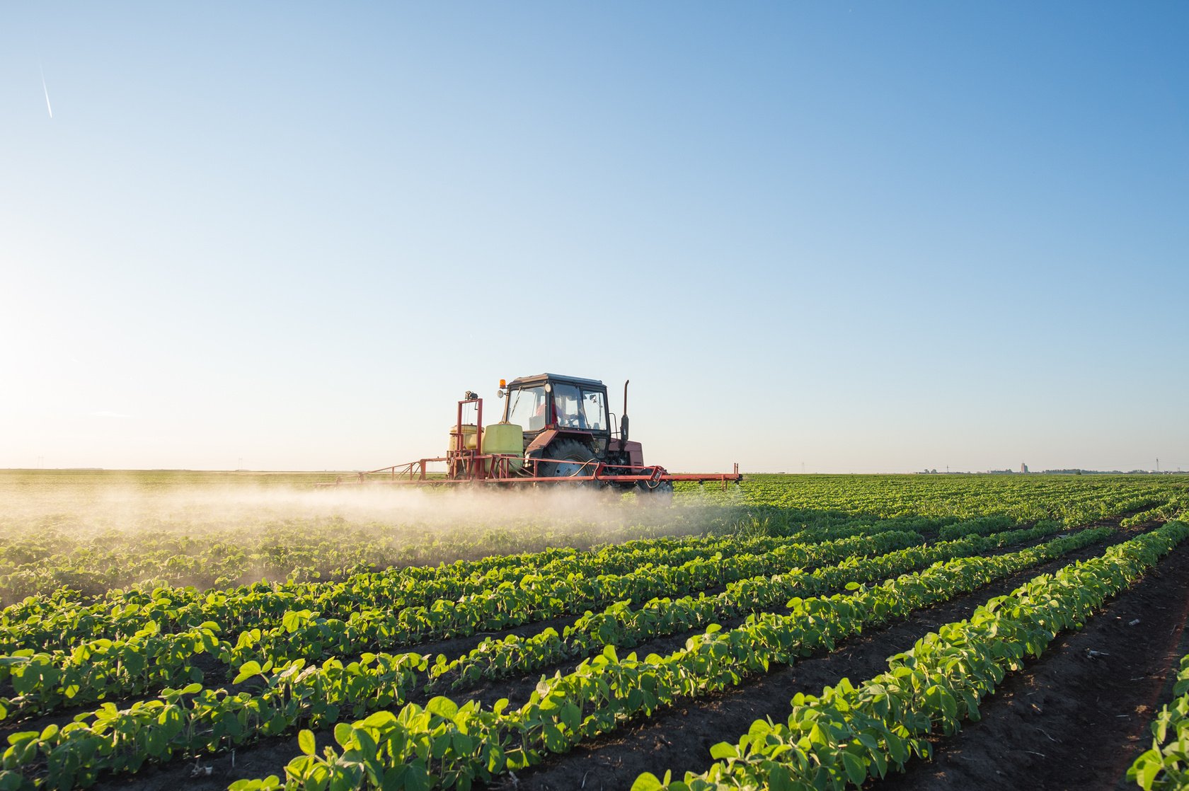 Tractor spraying